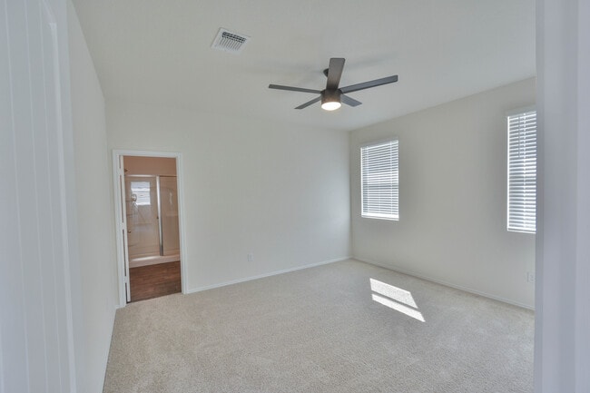 Master bedroom with master bathroom en suite - 3702 Chappie Lane