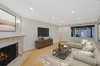 Building Photo - 15457 Moorpark St