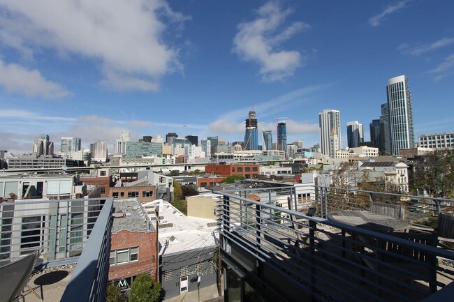 Building Photo - Rare Loft Style Condo, Huge Windows, High ...