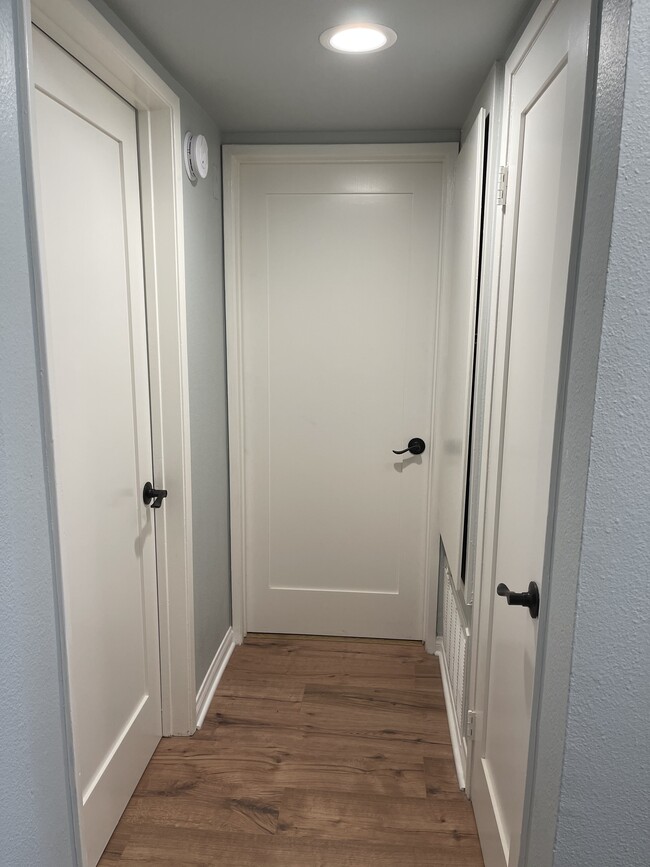 Doors to front bedroom, front bathroom and coat closet— all new - 5525 Canoga Ave