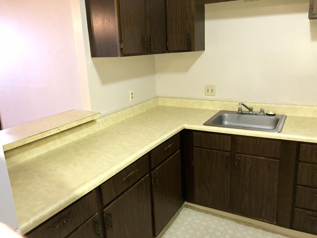 Kitchen Open to Living Space - Riverview Apartments