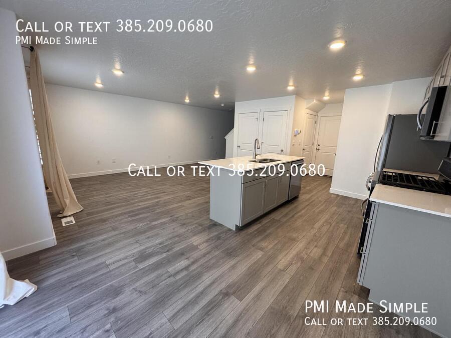 Primary Photo - Spacious 3-Bed Townhome with Modern Amenit...