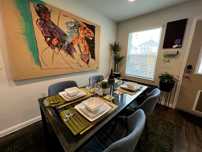 A modern dining table and dinette set lets you host cozy dinners with family and friends. - 9611 Morning Iris Dr