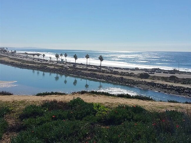 Building Photo - Enjoy unforgettable sunsets, fresh ocean air, and coastal living at its absolute best.
