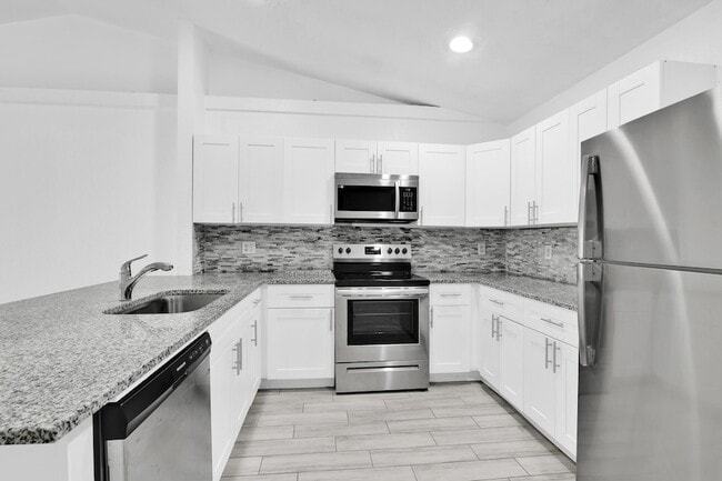 Photo - 13974 Folkestone Cir Townhome