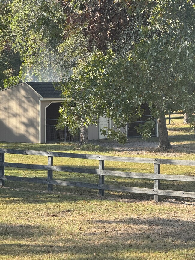 Pasture next door with two stall run in available for extra cost. Two horse maximum - 970 Shell Bluff Dr