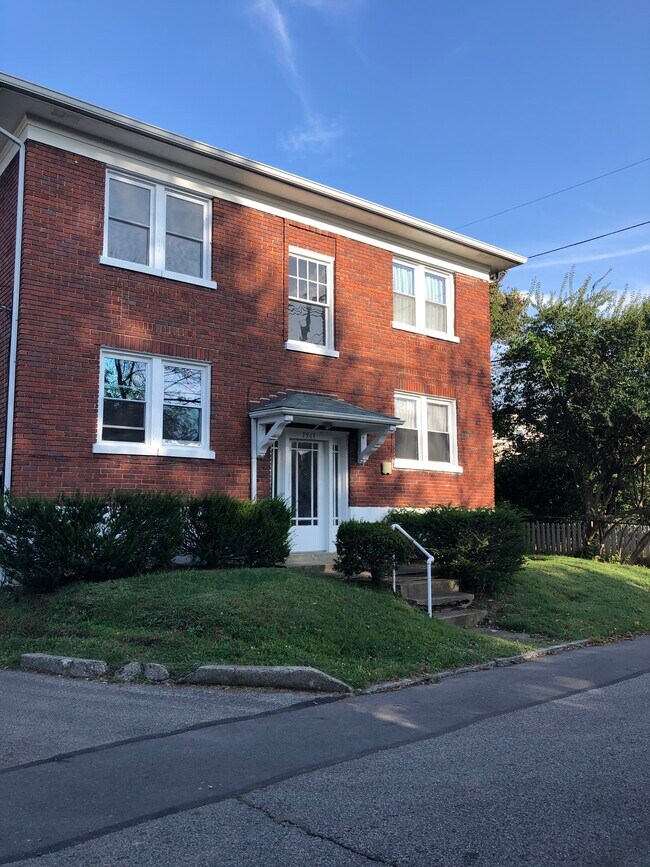 Front exterior, parking in rear of building - 1561 Fernwood Ave