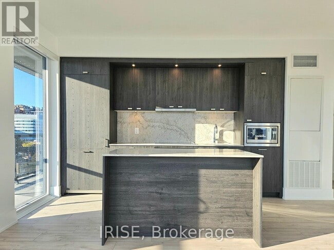 Photo du bâtiment - 115 Denison Ave