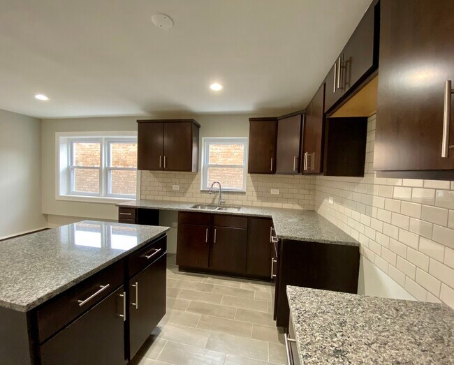 Foto del edificio - 5812 W 16th St