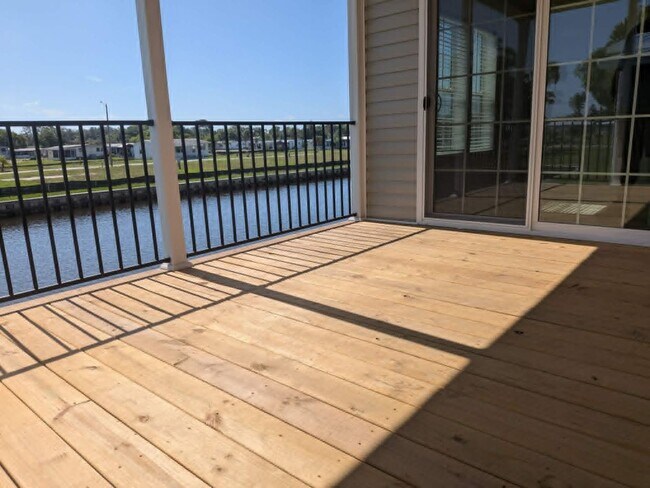Building Photo - 5702 Blue Harbor Dr