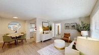 Located at 1655 Blue Bell Rd in Houston, TX, this single-story, one-bedroom, one-bathroom residence offers a thoughtfully designed layout across a comfortable footprint. Light-toned luxury vinyl plank flooring flows throughout, complementing the neutral wall palette and textured ceilings found in every room.

The open-concept living and dining area forms the heart of the home, bathed in natural light from large windows. The living room provides generous space for seating and entertaining, while the adjacent dining area accommodates a full dining set with ease. A pantry offers convenient additional storage nearby.

The galley-style kitchen is efficiently designed with ample white cabinetry, white countertops, a deep sink, and stainless steel appliances including a refrigerator, electric range, and dishwasher. A skylight enhances the brightness of the cooking space.

The spacious primary bedroom features a ceiling fan, a large window for natural light, and direct access to two closets. The full bathroom includes a soaking tub and shower combination with floor-to-ceiling tile surround. A private patio extends the living space outdoors, offering a dedicated area for relaxation.
