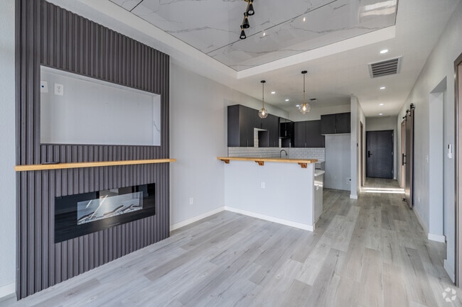 2BR, 2BA - 972SF - B5-Corner Unit - Living Area and Kitchen - The Tulsan at Midtown
