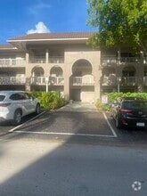 Building Photo - 100 Royal Palm Way