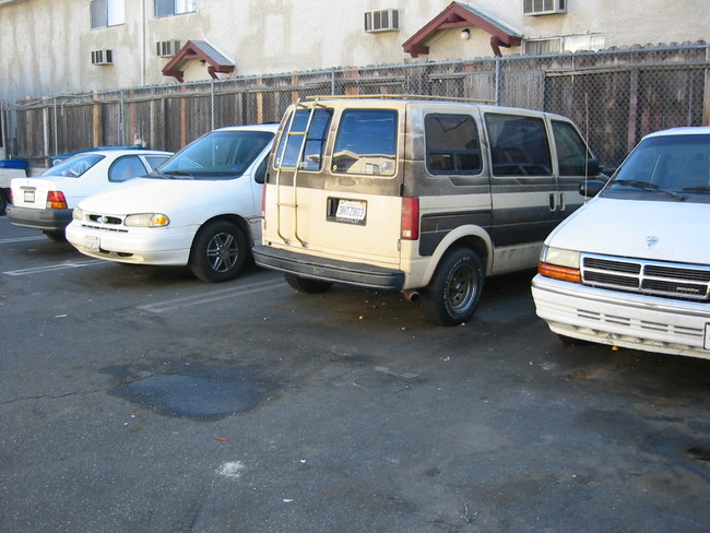 Building Photo- Parking Lot - Rayen Villas