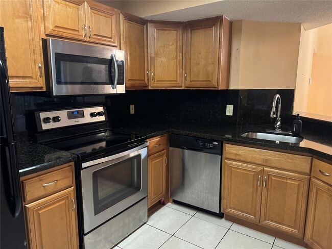 Photo - 9001 Wiles Rd Apartment