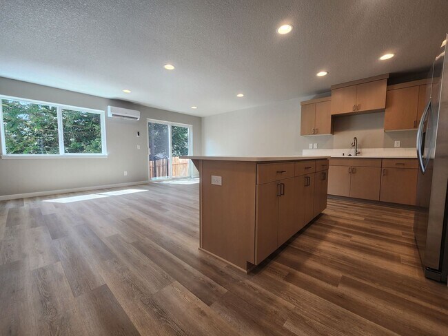 Building Photo - MOVE IN SPECIAL! Brand New Townhome in Cen...