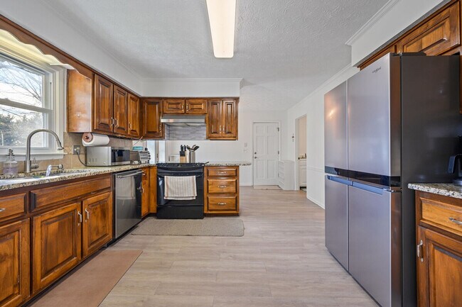 Foto del edificio - 1223 Settlebench Ln