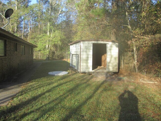 Building Photo - 12827 Hwy 105 E