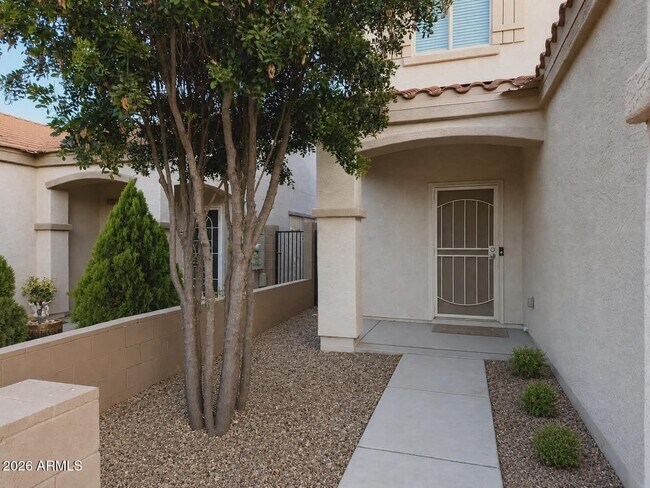 Building Photo - 8773 W Dahlia Dr