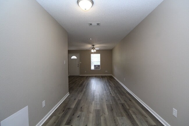 Building Photo - 2-Bed, 2-Bath Milton Duplex – Minutes from Highway 90, Open Layout with Luxury Vinyl Flooring and...