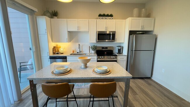 Unlock Culinary Potential: Enjoy a Fully-Equipped Kitchen - Triton Scotts Addition - Monument Apartments