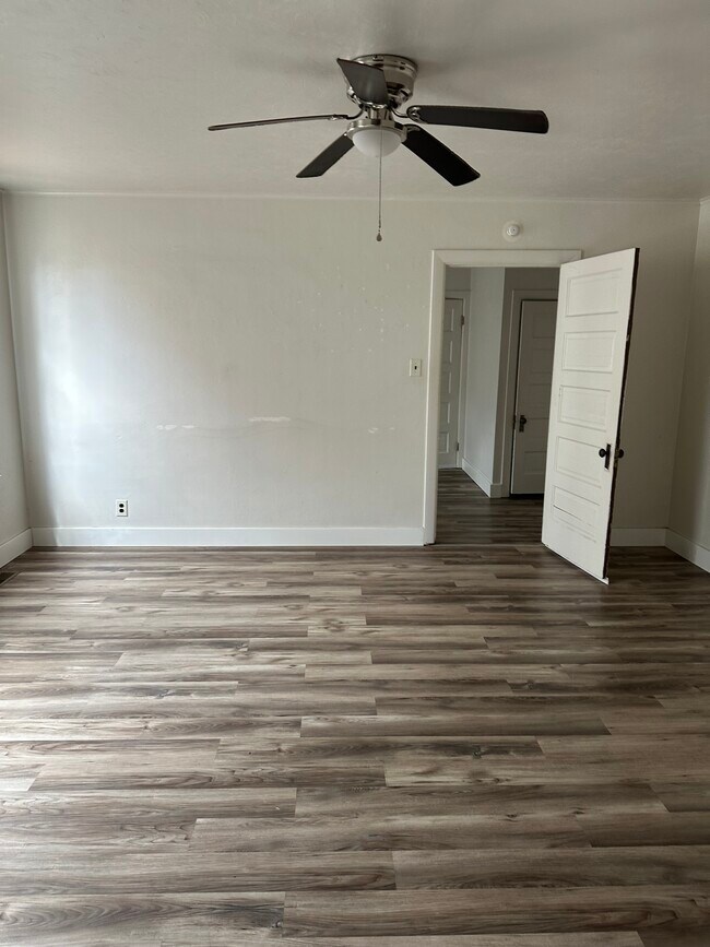 Spacious main living area. - 575 N Kansas St