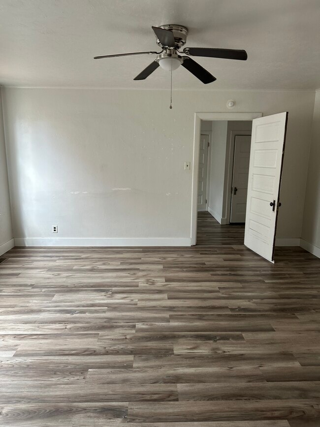 Spacious main living area. - 575 N Kansas St