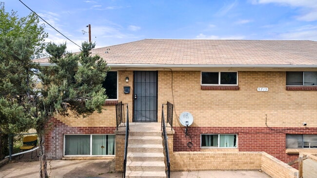 front - 5715 E 62nd Ave