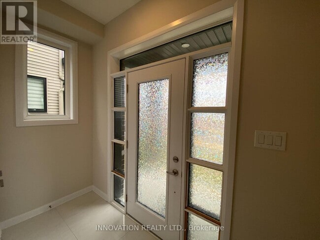 Photo du bâtiment - 213 Invention Blvd