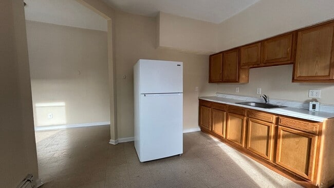 Photo - 4 Bedrooms 1.5 Bath Apartment with Heat and Hot Water Included!
