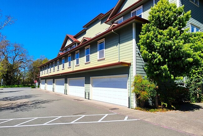 Building Photo - Pet-Friendly Town Green Condo with EV Charger