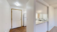 This single-floor, 3-bedroom, 2-bathroom home is designed for comfortable, practical living. The entrance opens into a bright, carpeted living area centered around a ceiling fan with light fixture, creating a welcoming and airy atmosphere. A pass-through galley kitchen adjoins the living space, featuring white cabinetry extending from floor to ceiling, light-toned countertops, a stainless steel sink, and white appliances — all finished with durable hardwood-style flooring that runs through the kitchen and entry areas.

The three bedrooms are carpeted and filled with natural light. The primary bedroom includes a ceiling fan and mirrored sliding closet doors, offering convenient storage. Additional bedrooms also feature ceiling fans, with one boasting dual corner windows that allow ample natural light. The home includes five closets in total, providing generous storage throughout.

Both bathrooms are identically appointed with white tub-shower combos fitted with curved chrome curtain rods, hardwood-style flooring, light-toned stone countertops, and white cabinetry — maintaining a clean, consistent aesthetic throughout. A dedicated laundry area houses a top-loading washer and dryer with overhead shelving. The overall design is clean, neutral, and move-in ready.