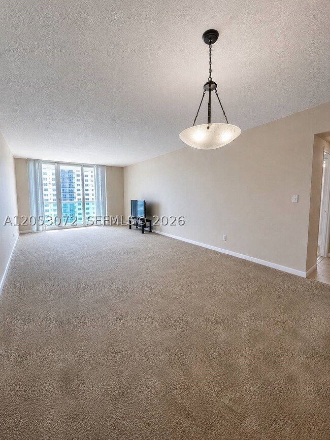 Building Photo - 19380 Collins Ave