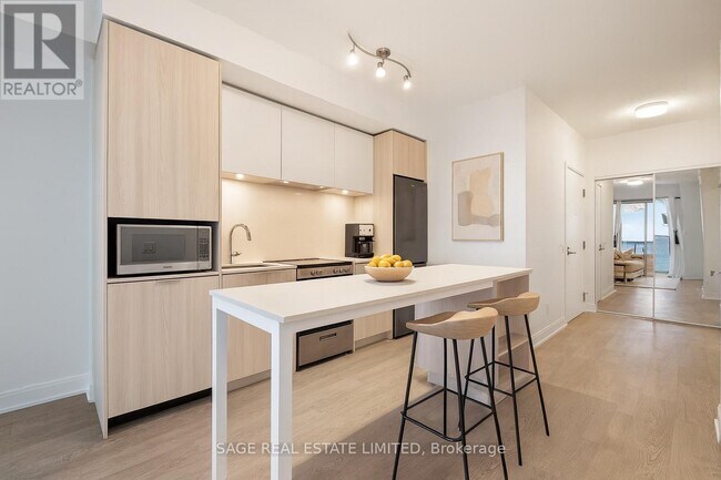 Photo du bâtiment - 70 Annie Craig Dr