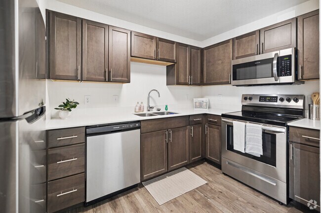 3 habitaciones, 1 baño - 1000 pies cuadrados - Cocina - Beachwood Apartments