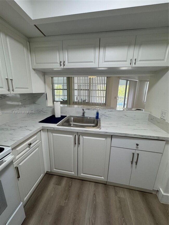Building Photo - 12850 SW 4th Ct