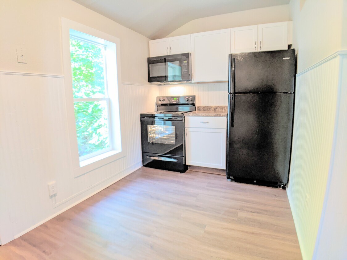 Kitchen off of family room. Brand new everything here! - 756 W Grand Ave