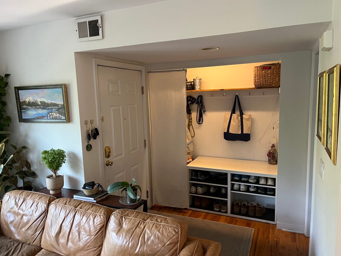 Entryway with plenty of storage for shoes, hooks, and cubbies. - 1641 N Washington St