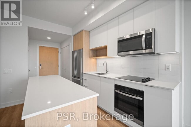Photo du bâtiment - 4235 Confederation Pkwy