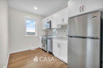 Building Photo - 21039-21025 25 Ave NW