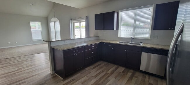 Building Photo - "Luxury Living: Stunning End Unit Townhome...