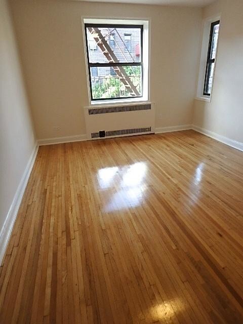 Building Photo - 8836 Elmhurst Ave
