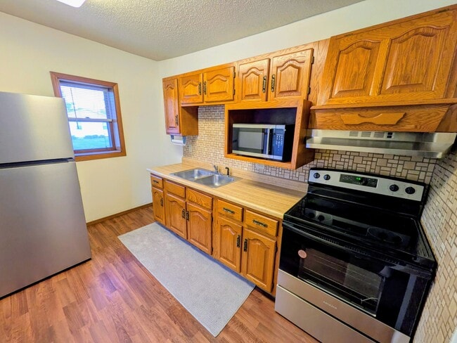 New stainless steel appliances - 1426 E 17th St