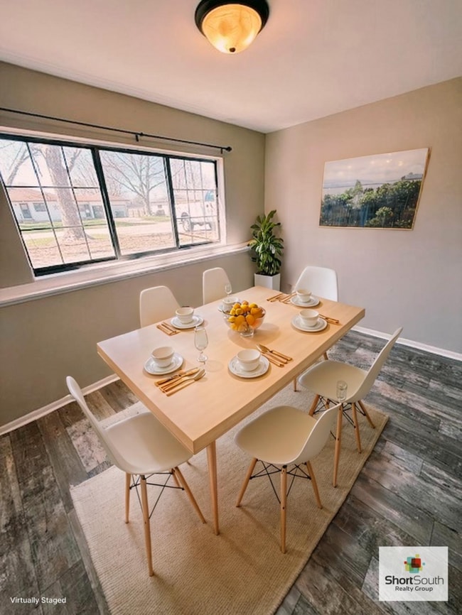 Building Photo - Updated 2 bed 1 bath main floor apartment with covered detached garage