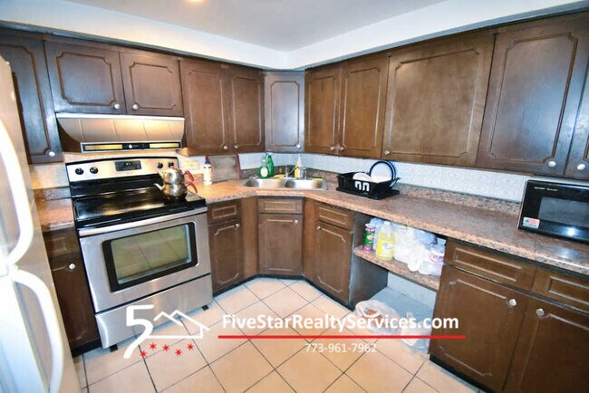 Foto del edificio - 4034 N Lowell Ave