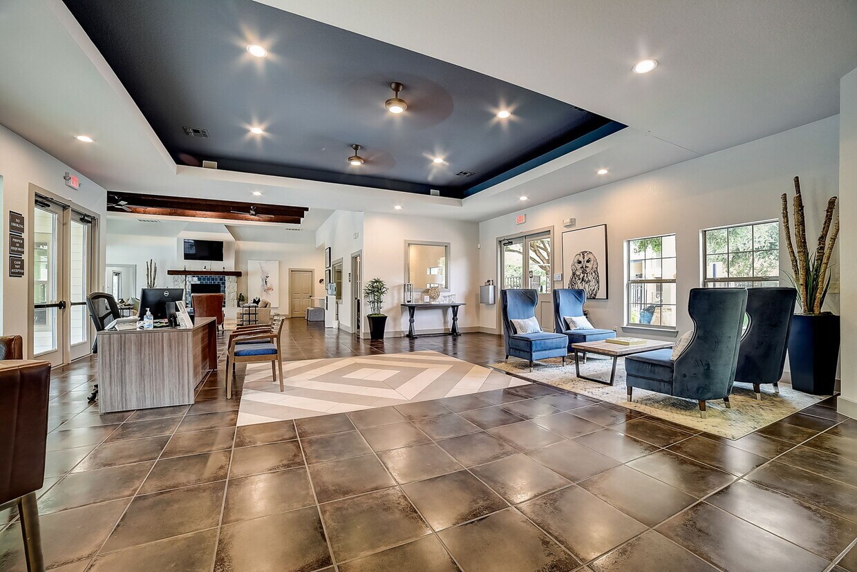 Sala de estar para residentes con café Starbucks - Azul Apartment Homes