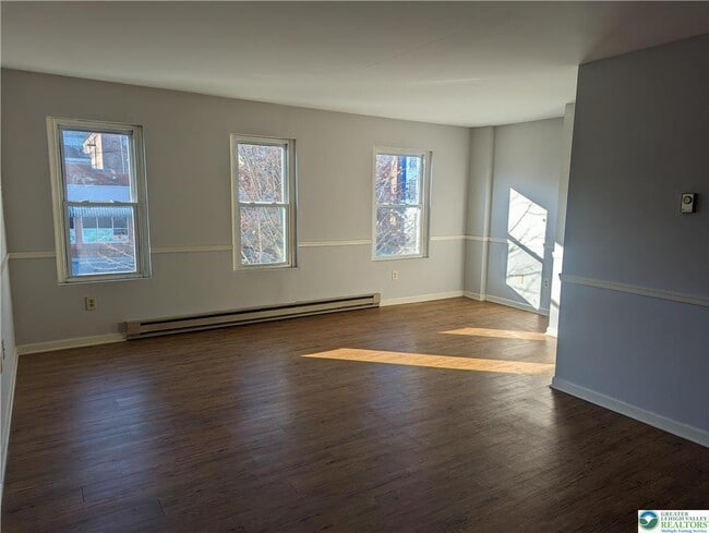 Building Photo - 111 E 3rd St