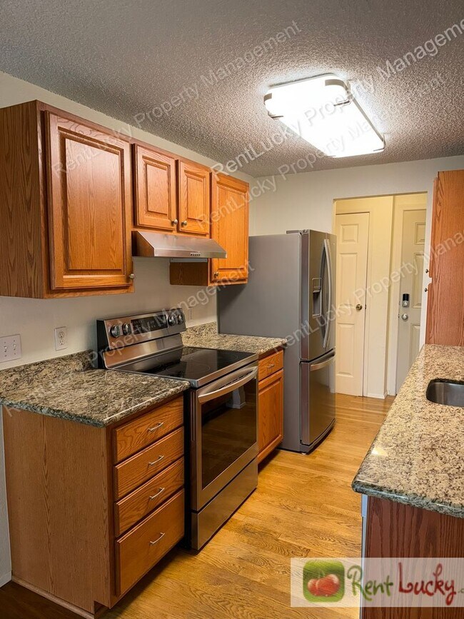 Building Photo - NEW Pricing! Amazing 1 Bedroom Kirkland Condo! Covered Parking and Outdoor Storage!