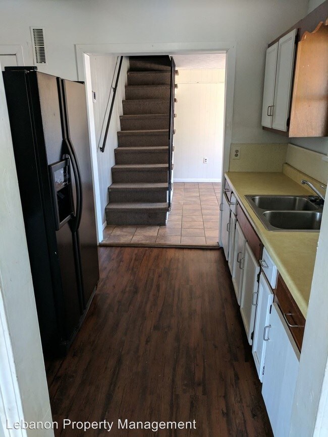 Building Photo - 4 br, 2 bath House - 112 W. 6th Street