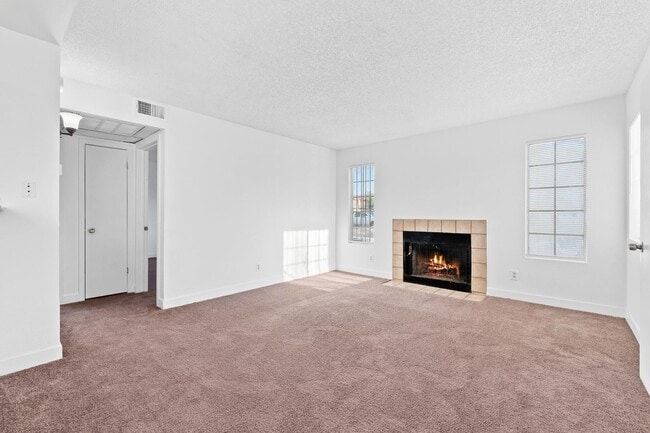 Building Photo - Spacious 2-Bedroom Condo with Fireplace – ...